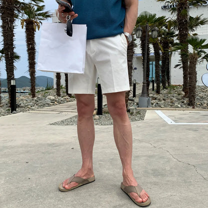 Men's loose straight casual shorts in black, khaki, and white solid colours.