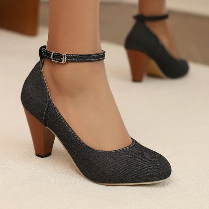 Women's blue denim platform heels with buckle closure and waterproof sole