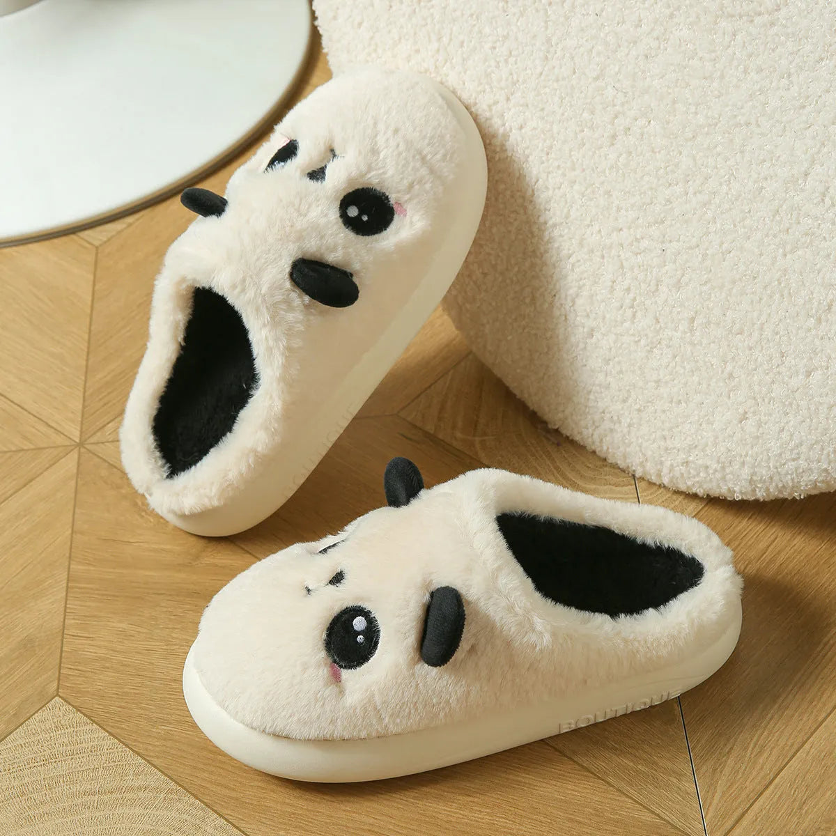Panda print cotton and linen toe ring slippers with a light coloured non-slip PVC sole.