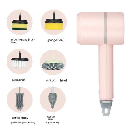 Green electric cleaning brush with multiple brush heads on a kitchen worktop.