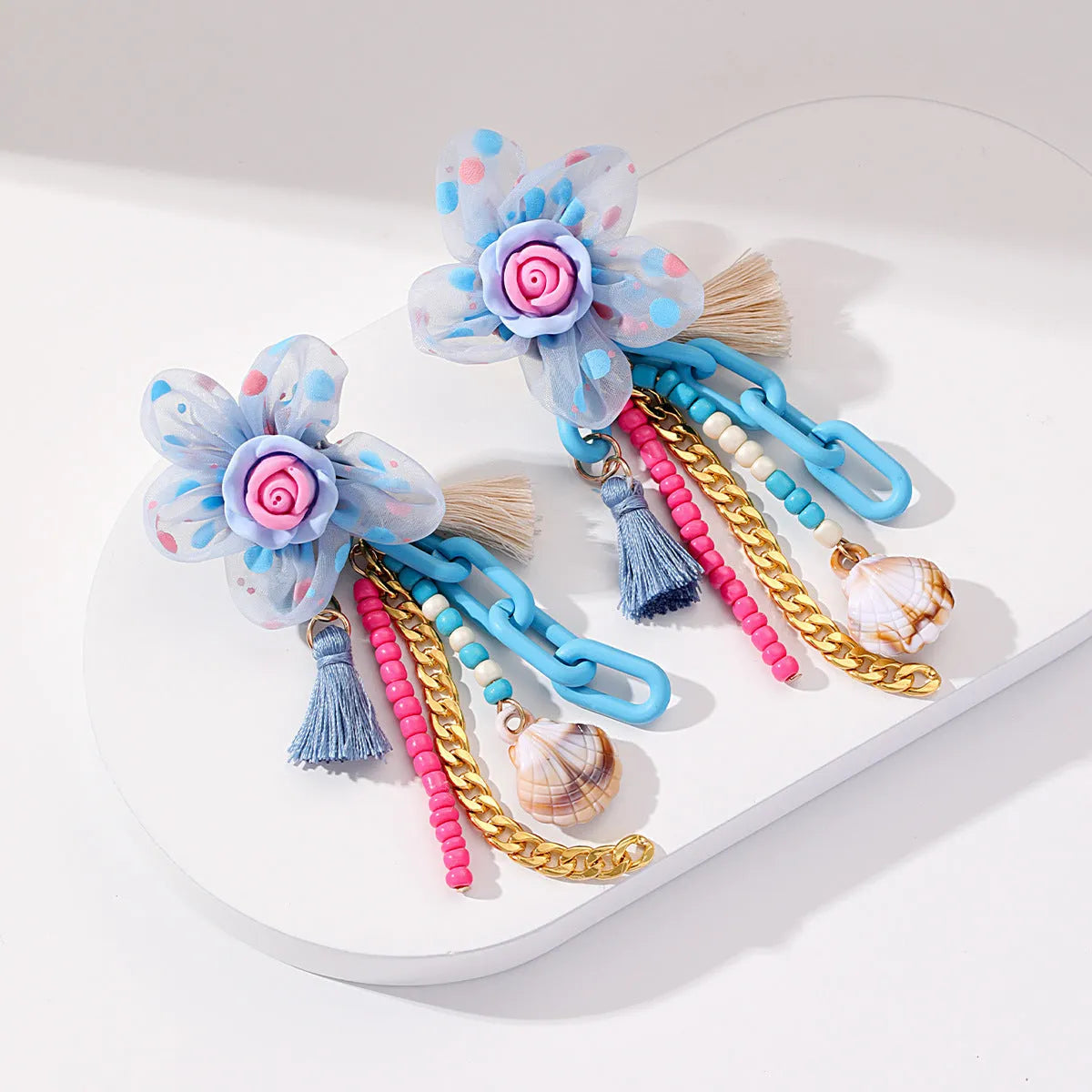 Handmade bohemian shell tassel earrings for women with colourful flower and geometric drop design