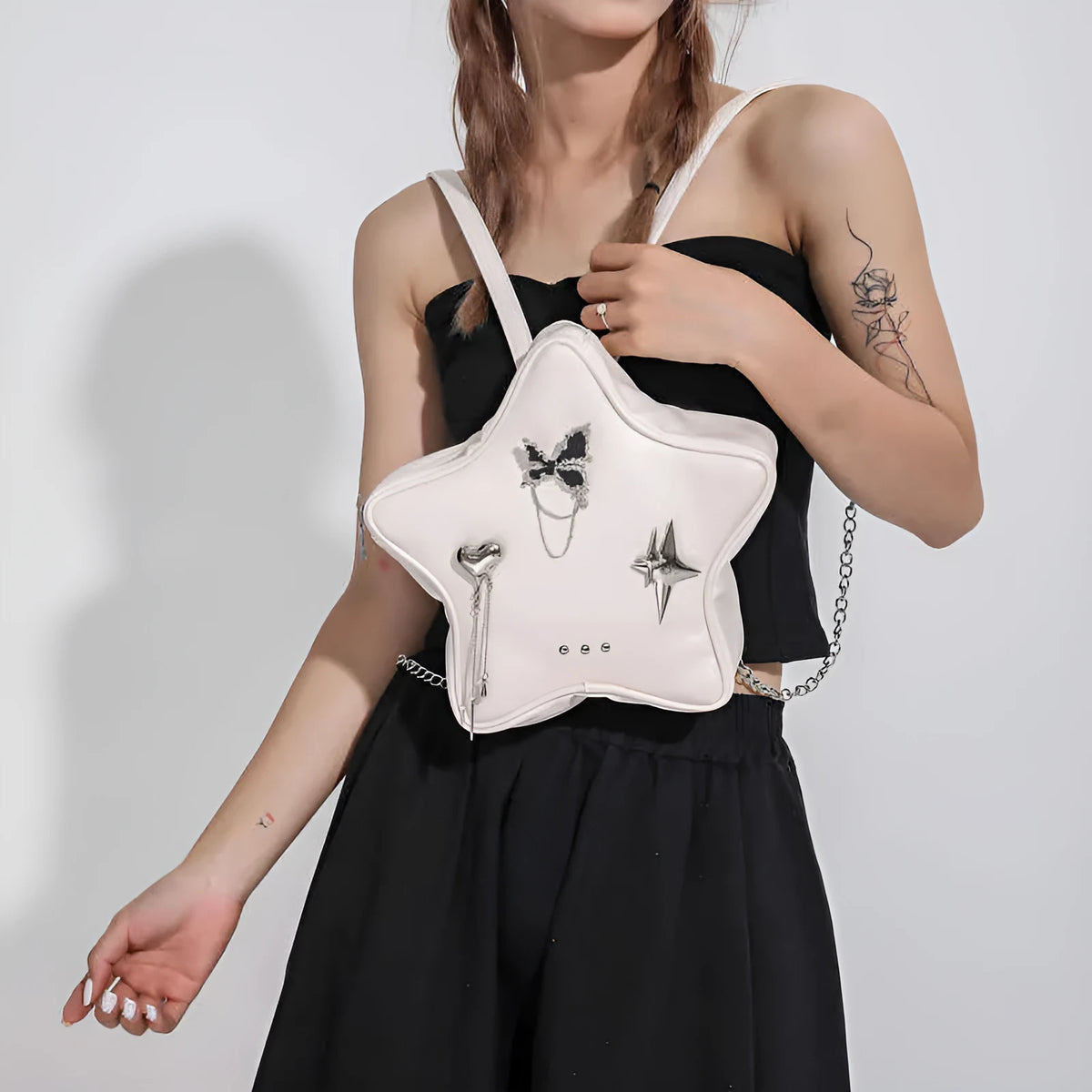 Soft PU leather women's mini backpack messenger bag shown in black, white, silver, and beige colours.