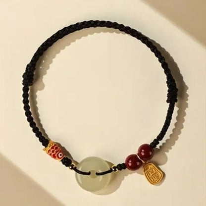 Hetian jade peace buckle bracelet with 10mm beads on red braided rope