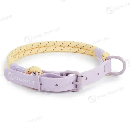 Solid colour PVC dog hand holding rope leash in dark red purple yellow showing collar attachment.