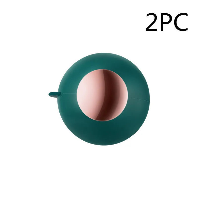Reusable gel lint roller ball in green gold colour for removing pet hair and lint from fabrics.