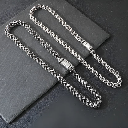 Men's antique silver titanium steel keel chain necklace with large geometric links on a black background.