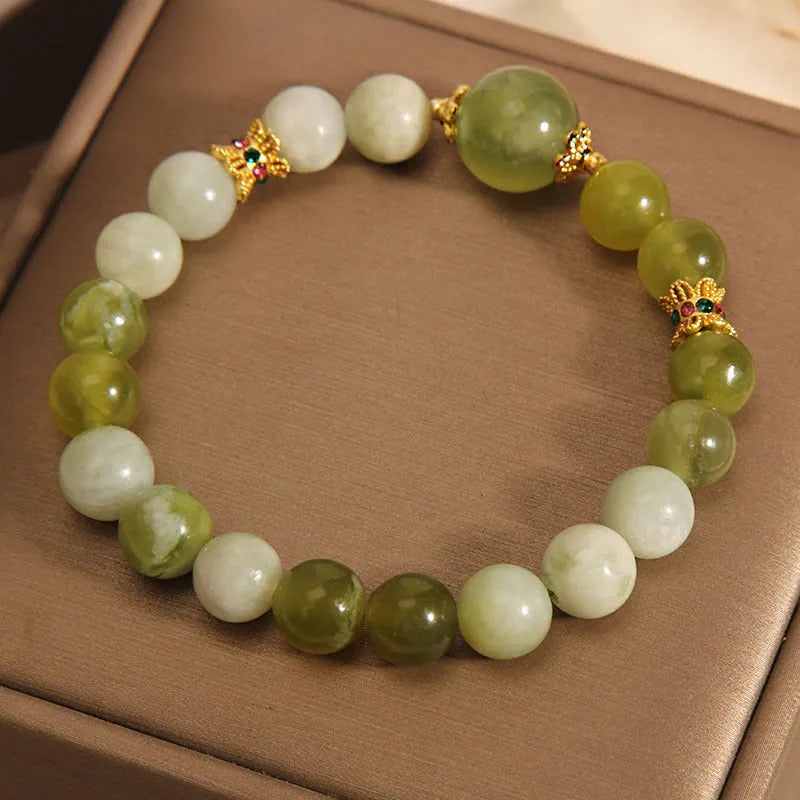 Original design jade bracelet in Xiuyan jade green colour, women's light luxury sweet Mori style jewellery.