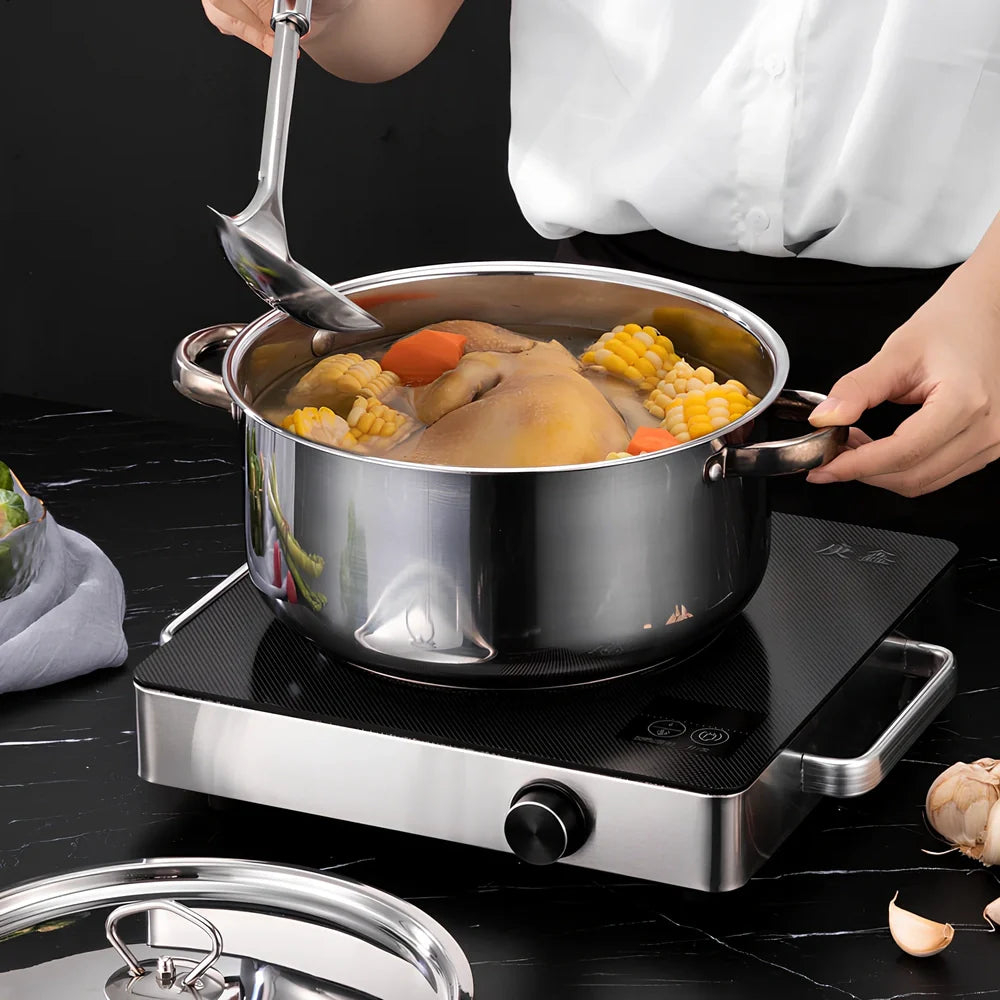 15-piece stainless steel cookware set with 12 pots, glass lids, non-stick pans, and utensils nested at 45x27x17cm