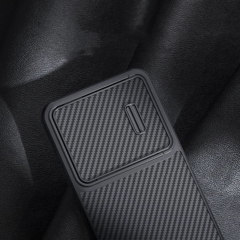Black Samsung Galaxy S23 Ultra mobile phone case with integrated lens push cover made from TPU, PC, and carbon fibre.