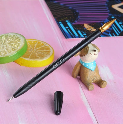 Diamond painting repair tool set with metal scraper pen, bottle of adhesive liquid, soft brush, and bamboo stick on a craft table