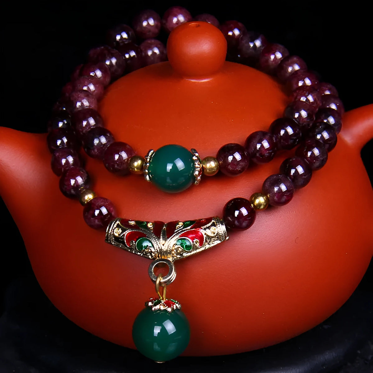Natural garnet bracelet with 7mm stones, double ring design and golden toad charm