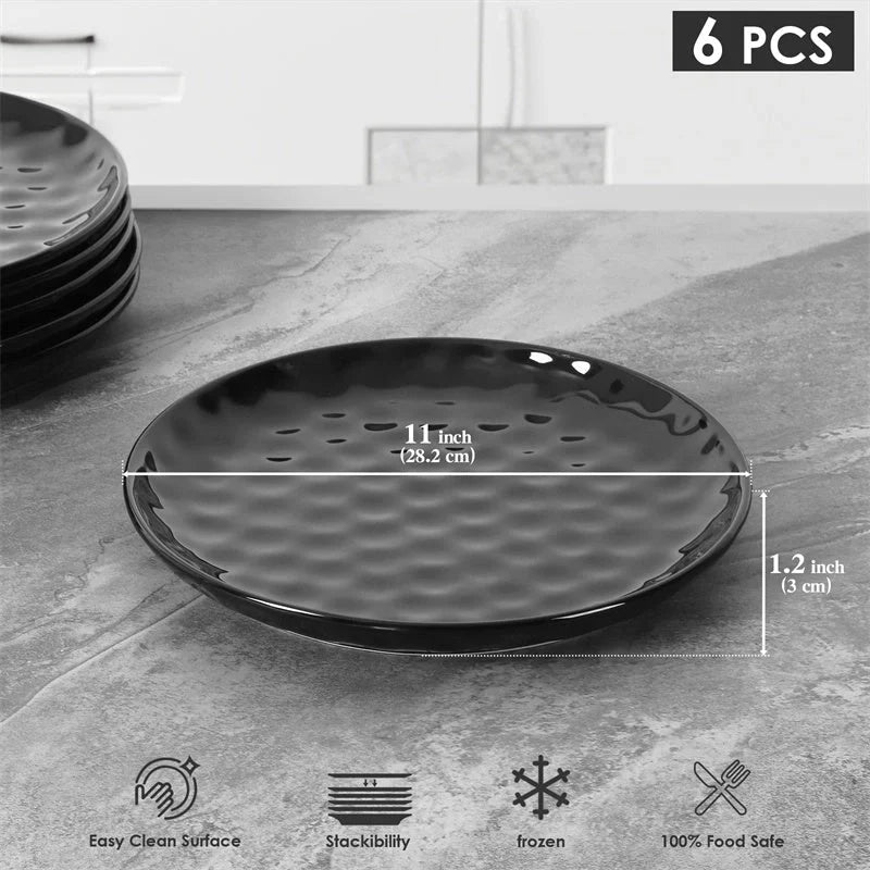 Elegant black ceramic dinner plate set with hammered design, perfect for parties and family dinners.