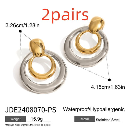 Round double layer hollow stud earrings with 18K gold electroplating on titanium steel, 12mm diameter