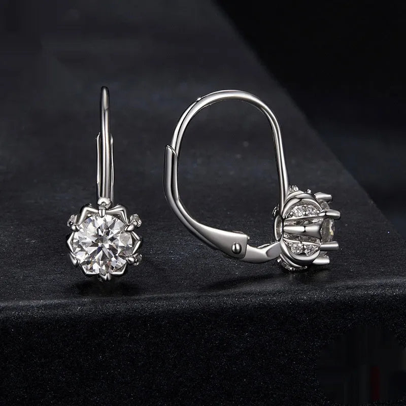 Sterling silver flower bud clip earrings with moissanite and white gold plating