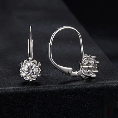 Sterling silver flower bud clip earrings with moissanite and white gold plating