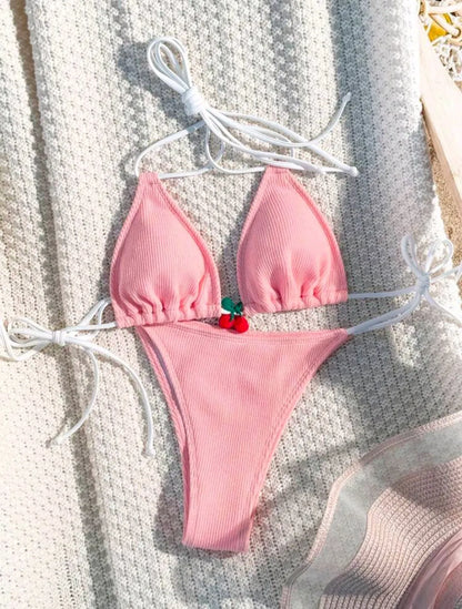 Women's sexy wind style bikini swimsuit in a solid colour, showing backless briefs design.