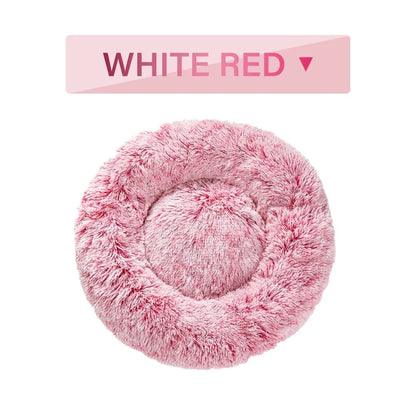 Fluffy donut-shaped pet bed with raised bolster edge in long plush material