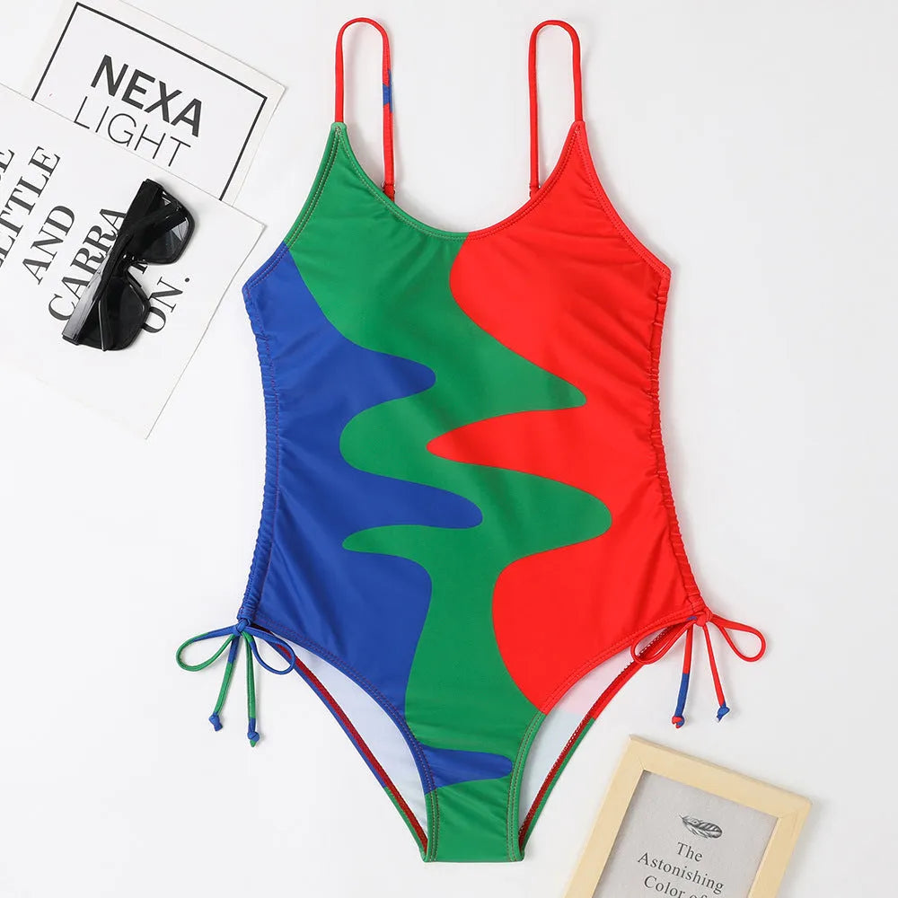 Women's sleeveless one-piece swimsuit in a striped print, shown in blue colour.