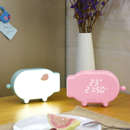 Blue LED alarm clock showing time and temperature with two USB charging ports