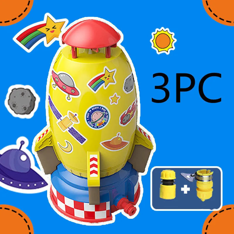 Yellow outdoor water pressure rocket launcher toy for kids on a green lawn.