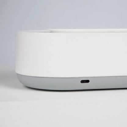 White portable ultrasonic cleaner with stainless steel tank for cleaning jewellery and glasses.