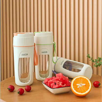 USB rechargeable portable blender cup with borosilicate glass liner in fresh orange, grass green, and light purple colours.