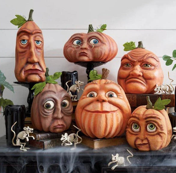 Premium resin pumpkin props in various sizes and expressions for spooky Halloween decor