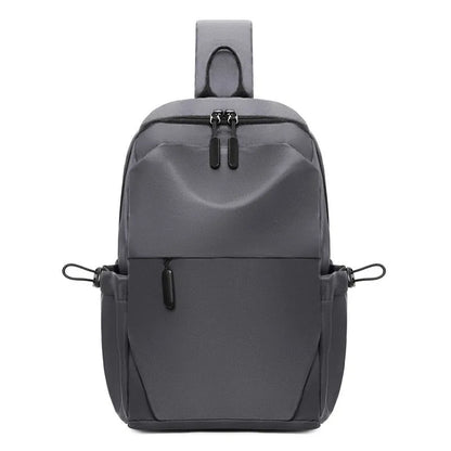 Men's waterproof messenger bag in grey showing front pocket and adjustable shoulder strap