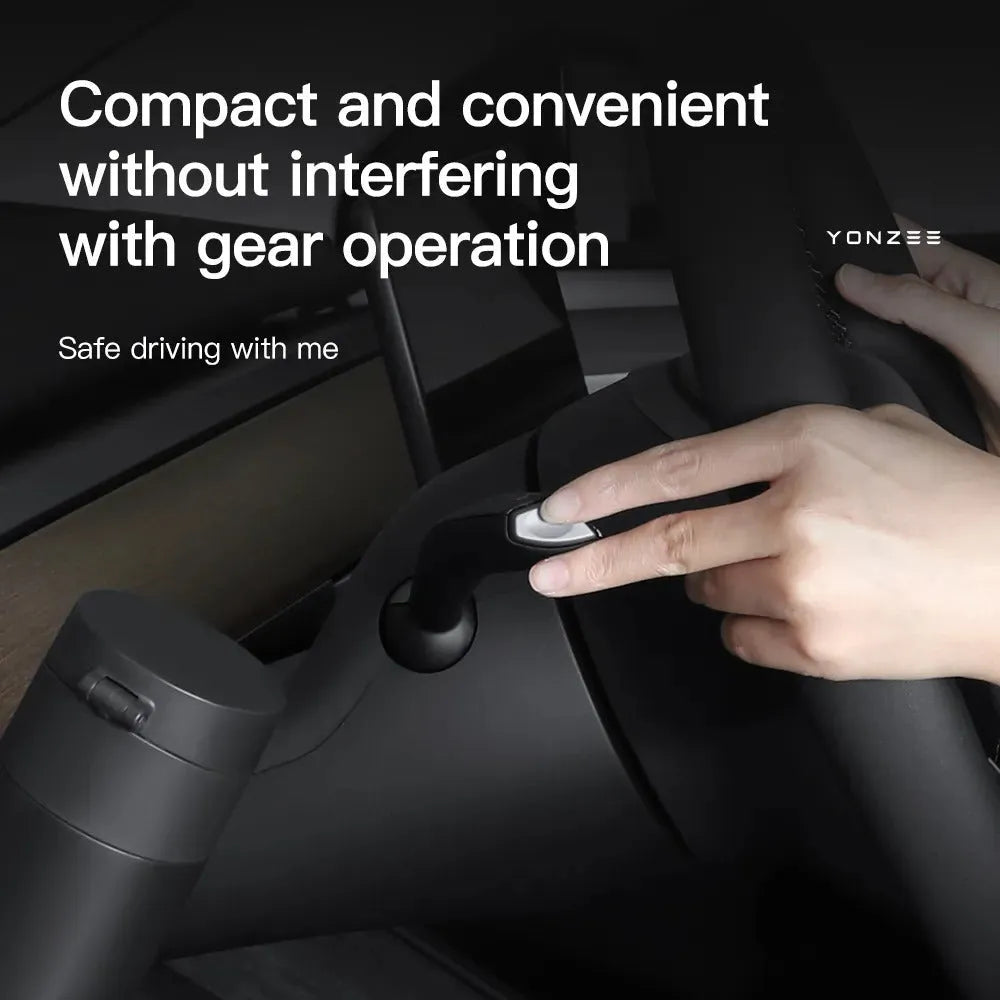 Tesla Model 3 and Y dashboard water cup holder in plastic with a carry handle.