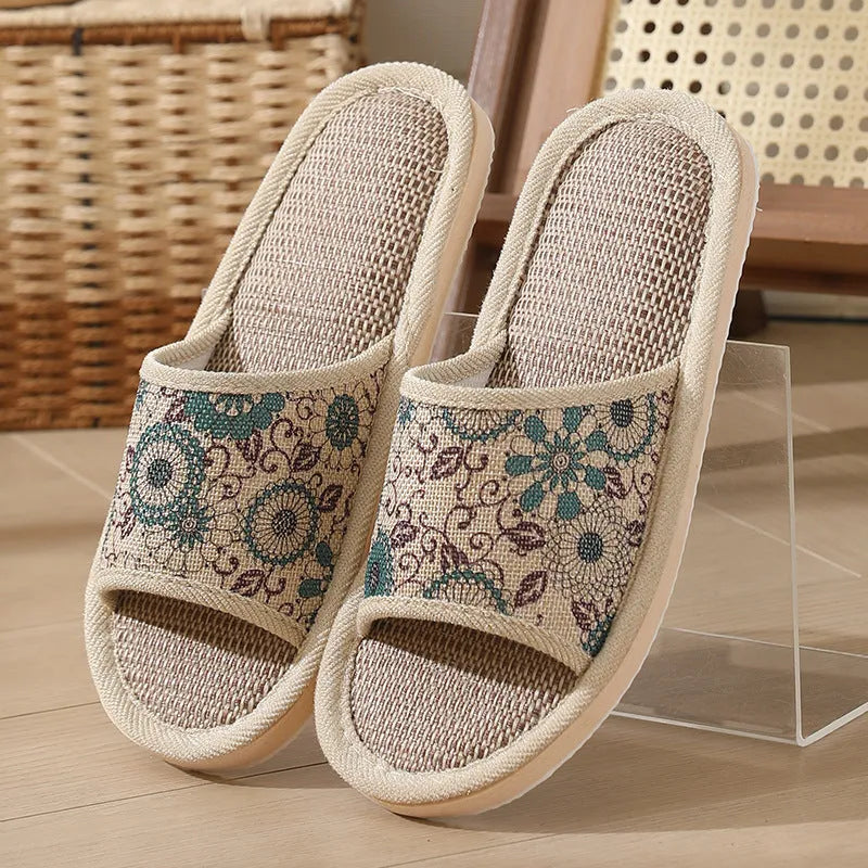 Women's open-toe linen slippers with thick sole in light brown colour.