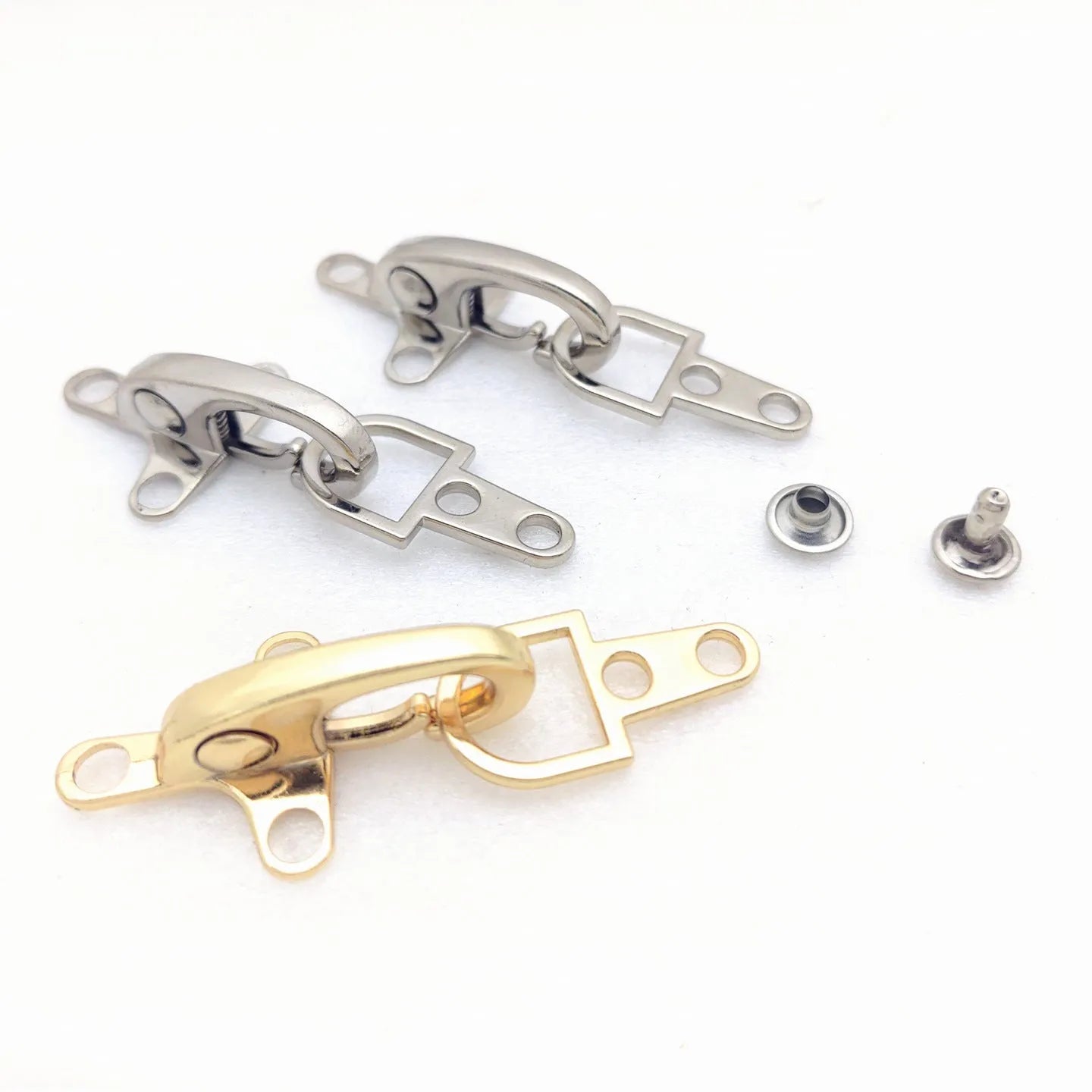 Zinc alloy aircraft buckle decorative clip in bronze, gold, gun, or silver finish.