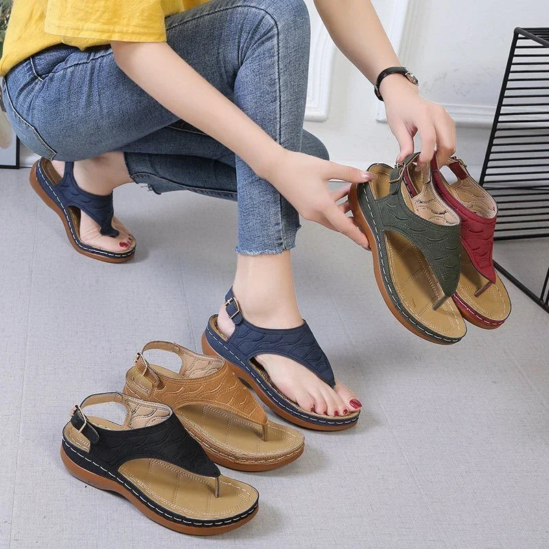 Comfortable women's wedge sandals in various colors with adjustable straps and a lightweight sole