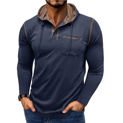 Man wearing a grey hooded henley long-sleeved t-shirt, showcasing the pullover style and cotton blend fabric.