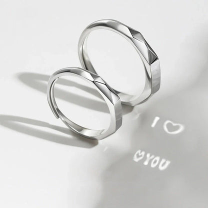 Elegant S925 sterling silver rings with a hidden love pattern design, adjustable sizing for a personalized fit.