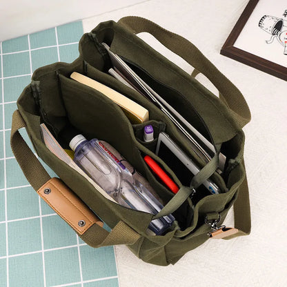 Large canvas tote bag in horizontal square shape with open-zip sides and internal organisers