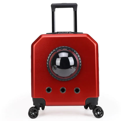 Hard PVC pet trolley flight case in orange colour with wheels and a pull handle.