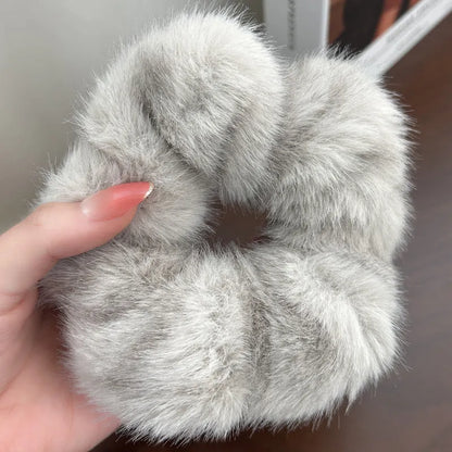 Large intestine coil hair band in mink-like waterproof fabric on a white background.