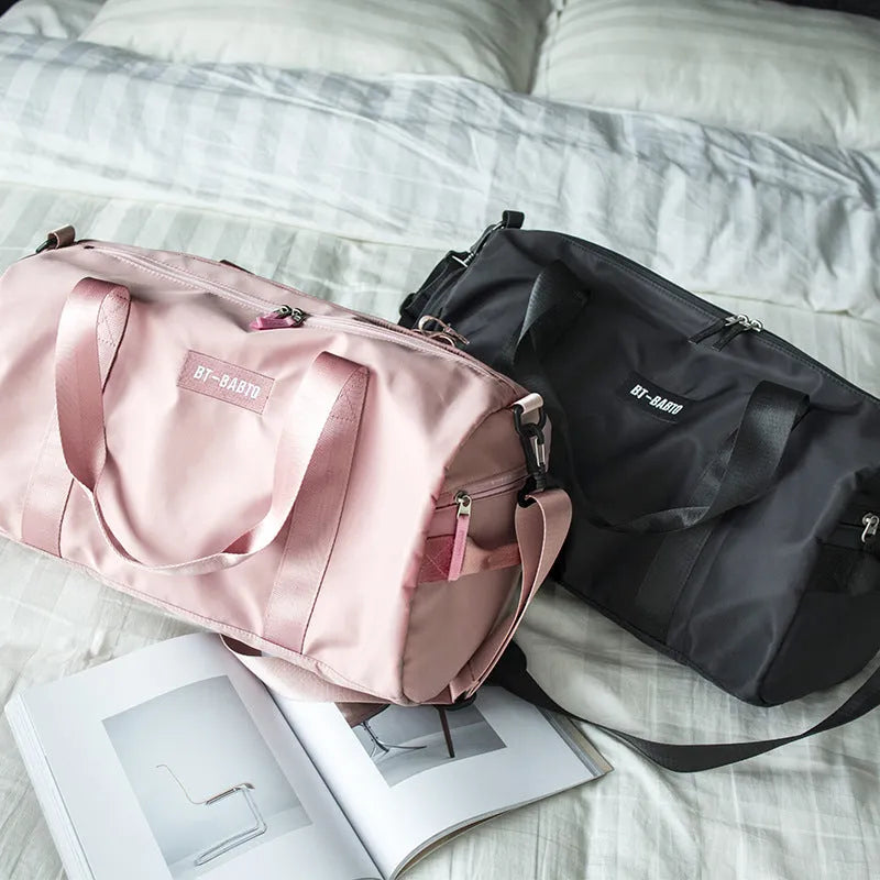 Beige casual sports bag with letter pattern and contrast colour details.