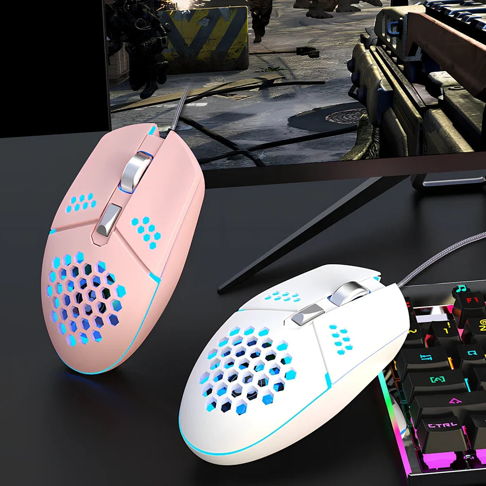 Black wired optical gaming mouse with cooling fan holes and ergonomic rat-sized design for desktop use