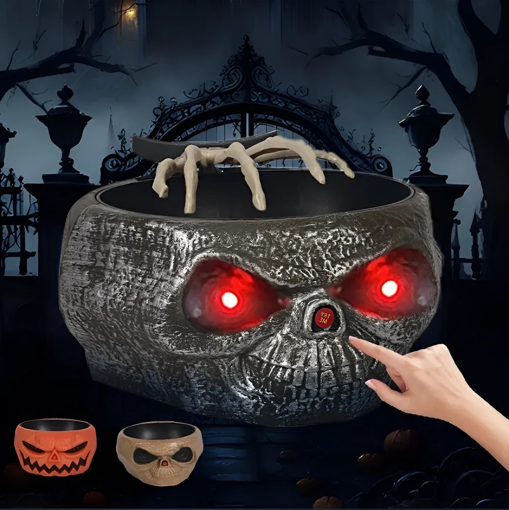 Motion-activated Halloween pumpkin candy bowl with lighted red eyes and skeleton hand in grey colour