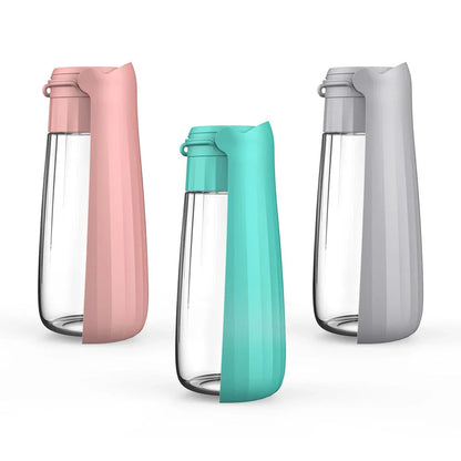 Portable folding dog water bottle with large 550ml capacity, available in multiple vibrant colors