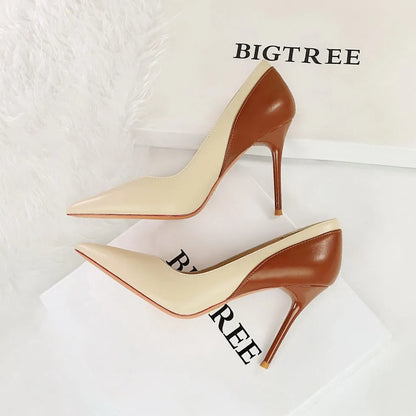 Retro style black stiletto high heels with pointed toe and colour matching pattern