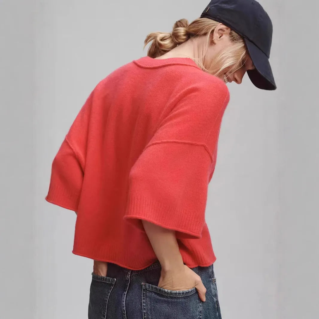 Women's red short sleeve viscose T-shirt with an exposed navel cropped design on a model.