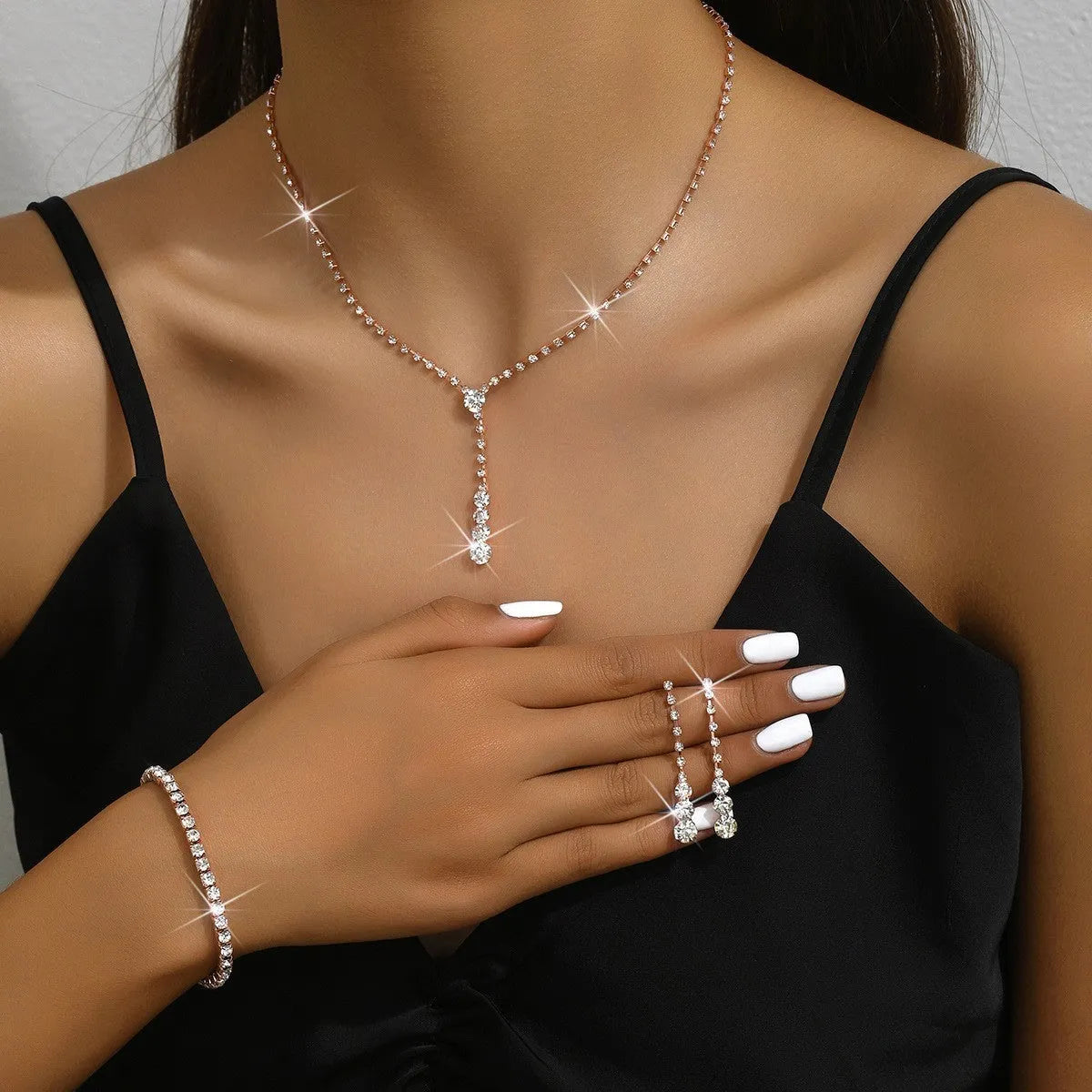 Rhinestone heart pendant jewellery set with necklace, bracelet and earrings in silver pink colour