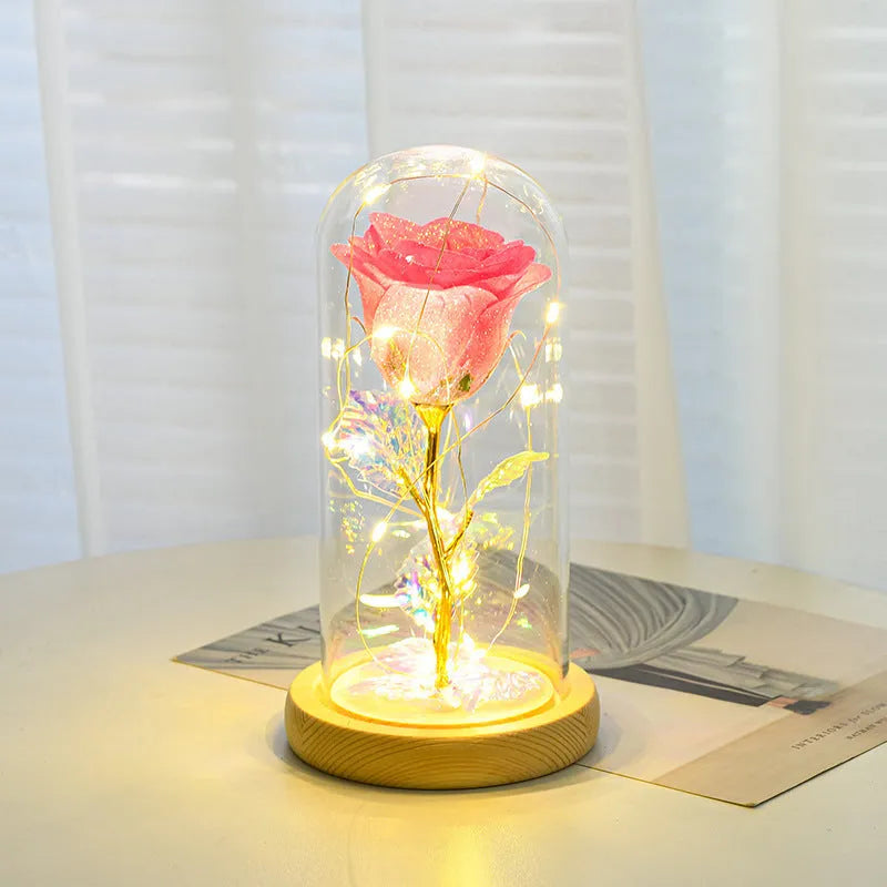 Eternal rose in glass dome with LED string lights, colour options include red, gold, grey, rose red, blue, pink