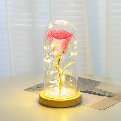 Eternal rose in glass dome with LED string lights, colour options include red, gold, grey, rose red, blue, pink