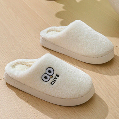 Stylish and cozy cartoon-inspired slippers with plush material and non-slip rubber soles, perfect for keeping feet warm and comfortable at home.