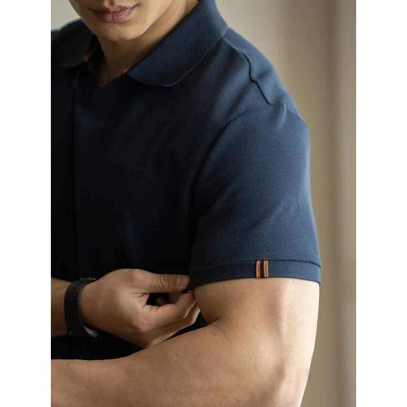 American-style cotton polo shirt in blue, black or white with short sleeves and regular fit