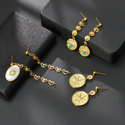 Geometric stainless steel earrings showing Eight Awn Star, Eye and Shell Sun designs