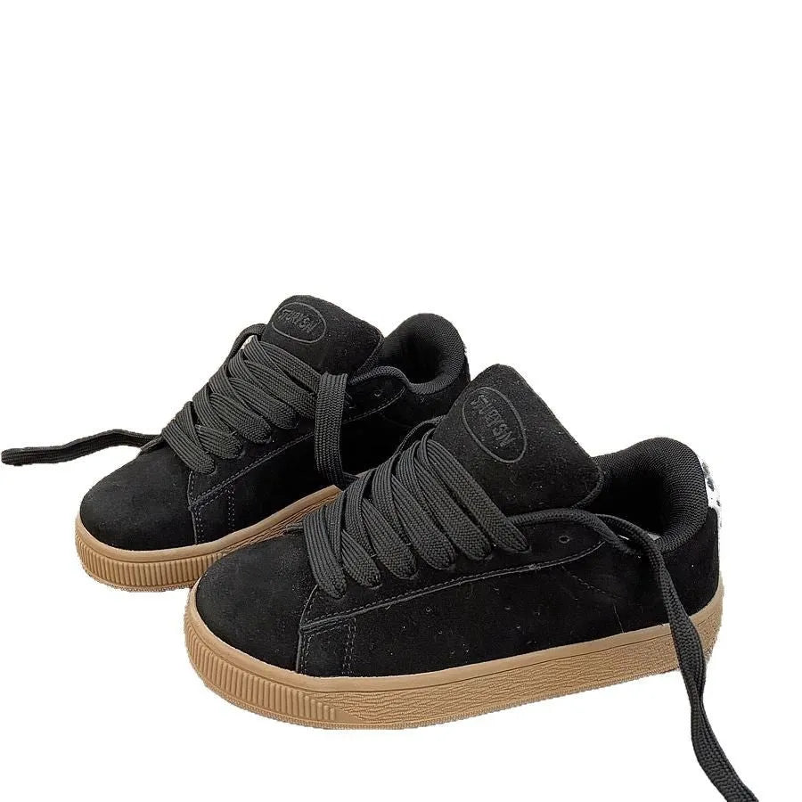 Black retro low-top sneakers with artificial PU upper, round toe and lace-up front closure on rubber sole